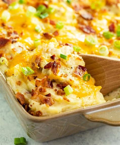 With a whole lot of decadence packed inside — bacon, cheddar, butter, sour cream — this potato casserole defines comfort food. The Pioneer Woman's Twice Baked Potato Casserole Recipe is ...
