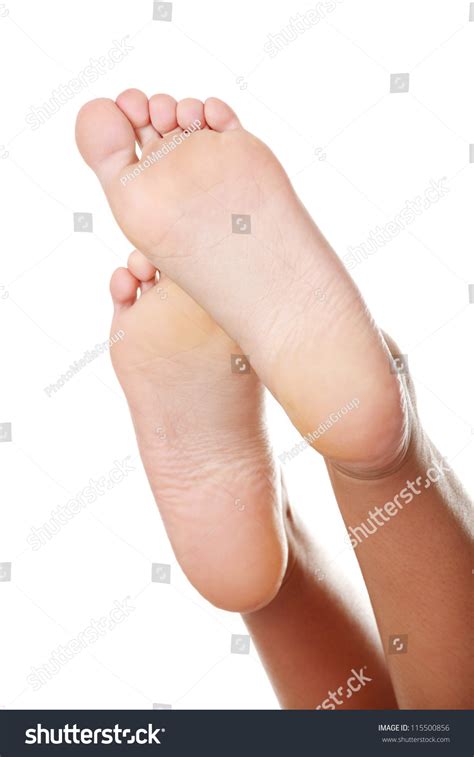 Beautiful Caucasian Woman Feet Isolated Over White Background Stock