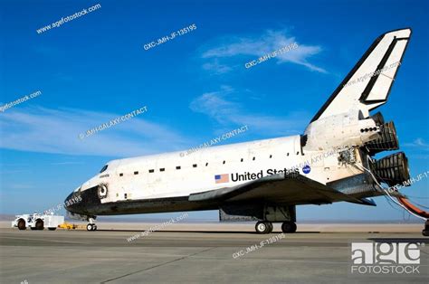 The Space Shuttle Atlantis Is Towed From The Runway At Edwards Air