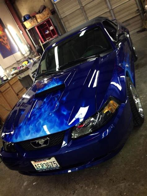 Custom Painted Blue Sports Car With Flames
