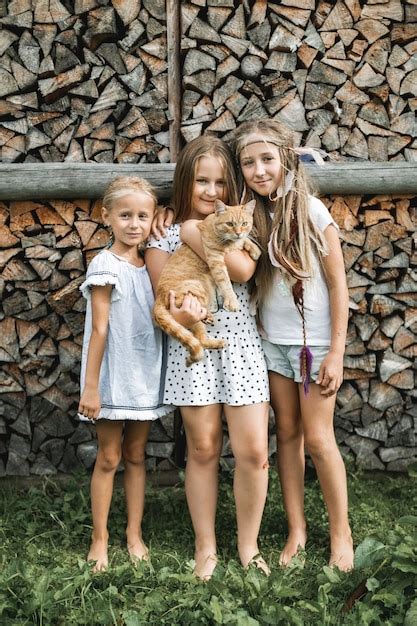 Premium Photo Portrait Of Three Little Pretty Girls Sisters In