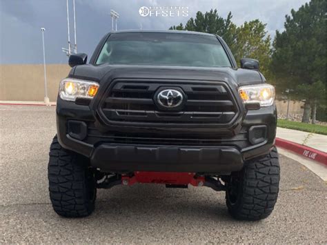 2018 Toyota Tacoma With 20x12 44 Tis 544bm And 33125r20 Nitto Mud