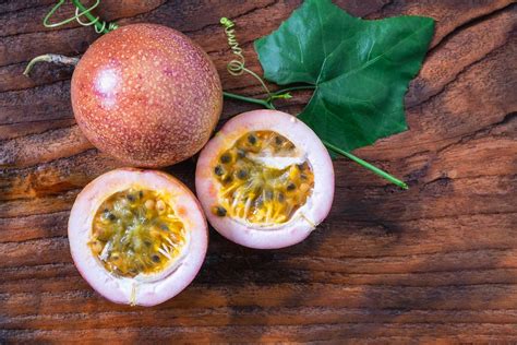 Passion fruit is a small, round fruit with a hard purple casing and a delicious, sweet, and tangy yellow pulp with edible seeds. Top 8 Health Benefits of Passion Fruit: HealthifyMe Blog