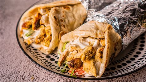 While it's often served in a pita, it's equally delicious served on a bed of romaine and topped with cucumbers, tomatoes, and feta. Chicken Shawarma Recipe - Easy NO OVEN | Hungry for Goodies