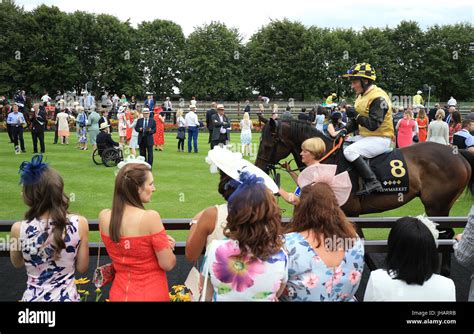 Horses Parade Before The Town Plate During Ladies Day Of The Moet And