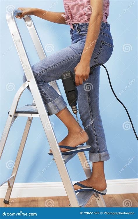 Woman With Drill Climbing Ladder Stock Image Image Of Casual Mature
