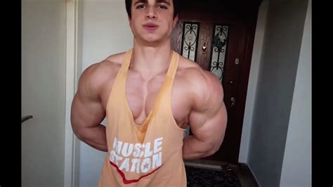 The Super Muscular Man Flexing His Biceps Youtube