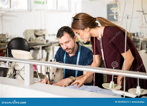 Supervisor Giving Advice To A Tailor Stock Image Image Of Industrial
