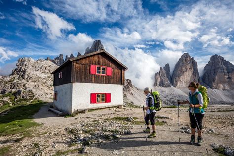 Photo Prints Wall Art Hikers And Hut Beside Rifugio Locatelli Tre