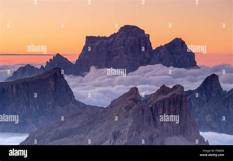The Dolomites At Dawn Tide Of Clouds Stock Photo Alamy