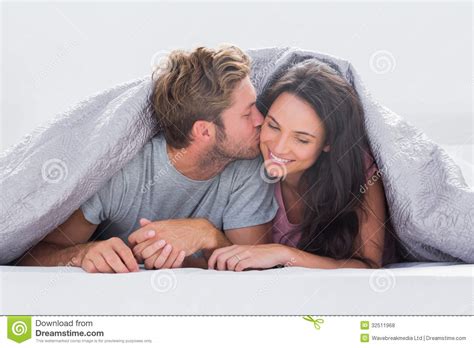 Skoliosexuality, sometimes spelled scoliosexuality, is the attraction to people who are transgender or nonbinary. Attractive Man Kissing His Wife Royalty Free Stock Photos ...