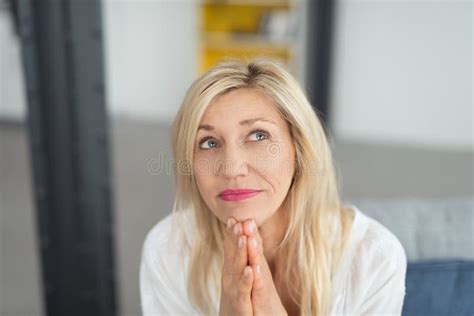 Thoughtful Blond Woman In A Close Up Profile Portrait Stock Image Image Of Shopping Looking