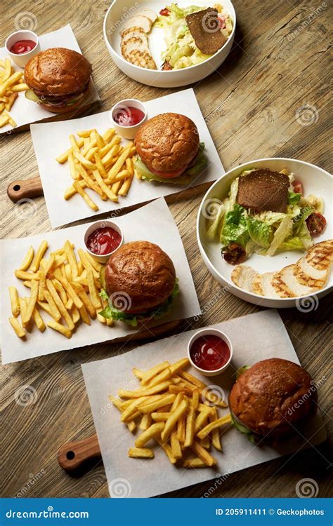 Set Of Burgers With French Fries And Ketchup Sauce Stock Image Image
