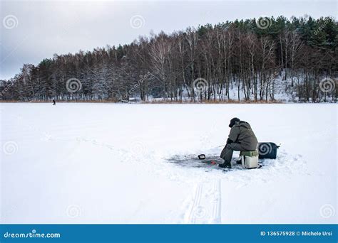 Fishing On A Frozen Lake In Winter Stock Photo Image Of Fishing