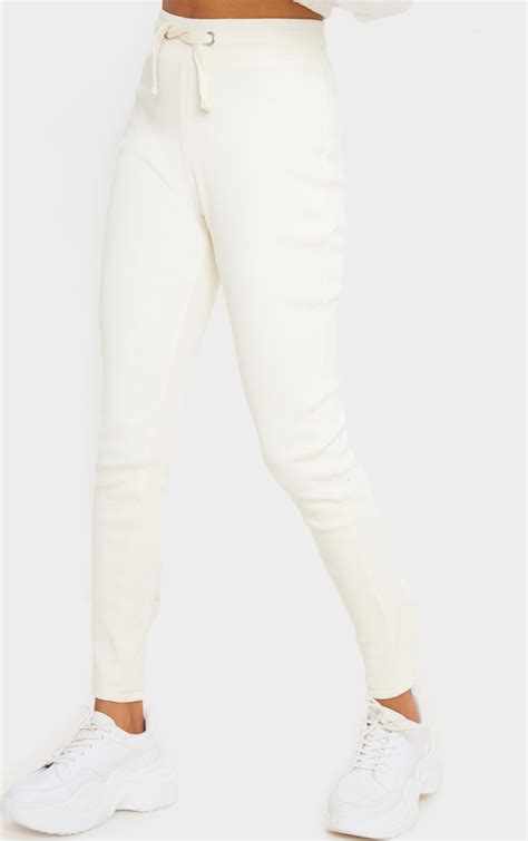 Cream Ribbed Skinny Jogger Trousers Prettylittlething Ie