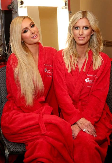 Paris Hilton Strips Naked With Lookalike Sister Nicky As They Wow In
