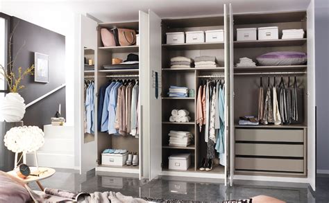 Thicker sweaters and forgiving materials can be folded in the glass drawers that offer a nice overview. White Wardrobe With Drawers Inside - Wardobe Pedia
