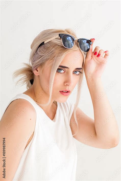 Fashion Model In Sunglasses Beautiful Young Woman With Sunglasses On Head Concept For
