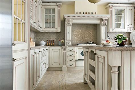 Aesthetic antique style kitchen cabinets of wooden materials finished in white. Antique White Kitchen Cabinets (Design Photos) - Designing ...