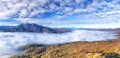 Green Mountain Surrounded By Fogs Under Cloudy Sky Hd Wallpaper