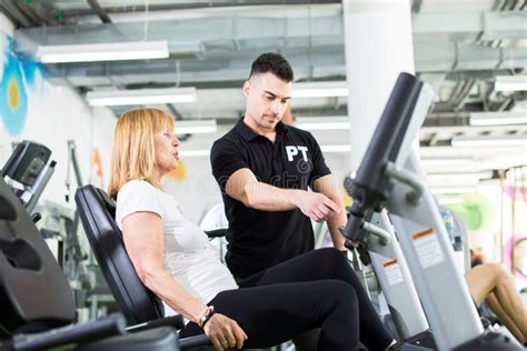 Senior Woman With Personal Trainer Stock Image Image Of Fitness
