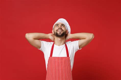 Young Bearded Male Chef Cook Or Baker Man In Striped Apron White T Shirt Toque Chefs Hat Posing
