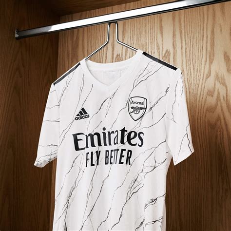 The red design tries to resemble marble and this is inspired in the marble hall, part. Better? Monochrome Arsenal 20-21 Away Kit - Footy Headlines