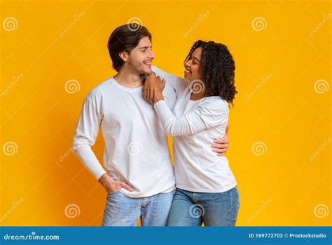 Romantic Interracial Couple Cuddling And Looking At Each Other Stock Image Image Of Girlfriend