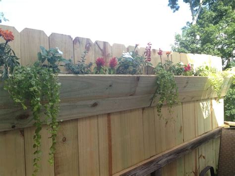 What smells better than a lovely cedar planter? 25 Fence Planters That'll Have You Loving Your Privacy ...