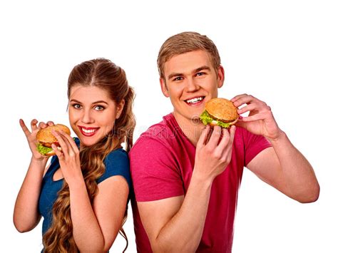 Man And Woman Eating Big Sandwich With Cola Isolated Stock Image