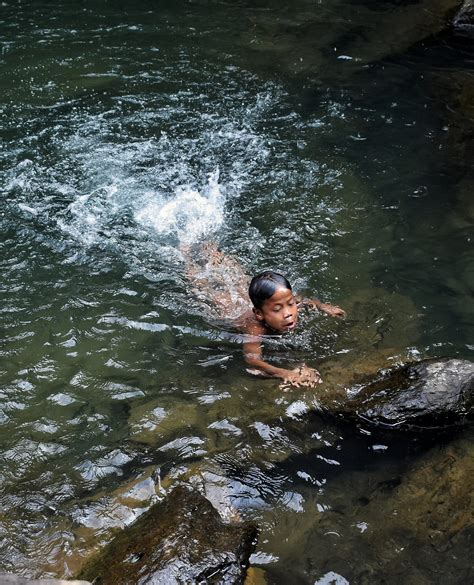 A Child Bathing In The Stream Pixahive