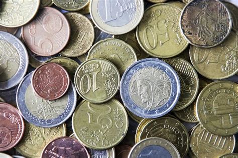 Euro Coins And Bank Notes From The Countries In The European Union