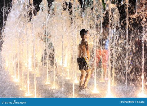 Children Playing Water Fountain