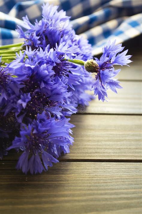 Blue Flowers Of Cornflowers Rustic Bouquet Picked In Summer Located On
