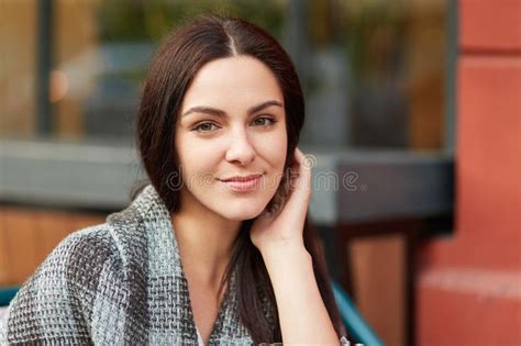 People Recreation And Beauty Concept Pleasant Looking Brunette Female