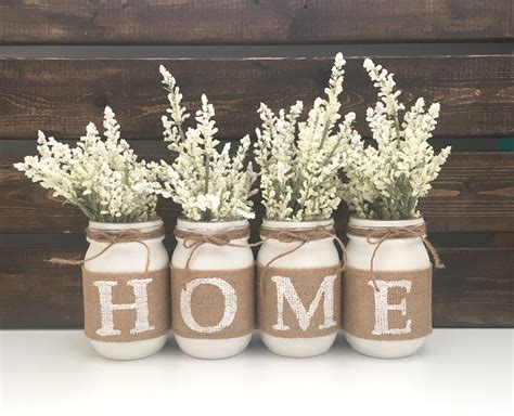 That's all it takes and you have a lovely mason jar wall decor that can hold a candle or flower or whatever you want! Home Mason Jar Decor Mason Jar Set Burlap Mason Jars