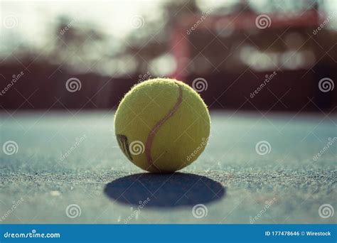 Closeup Shot Of A Yellow Tennis Ball In A Tennis Court Editorial Photo