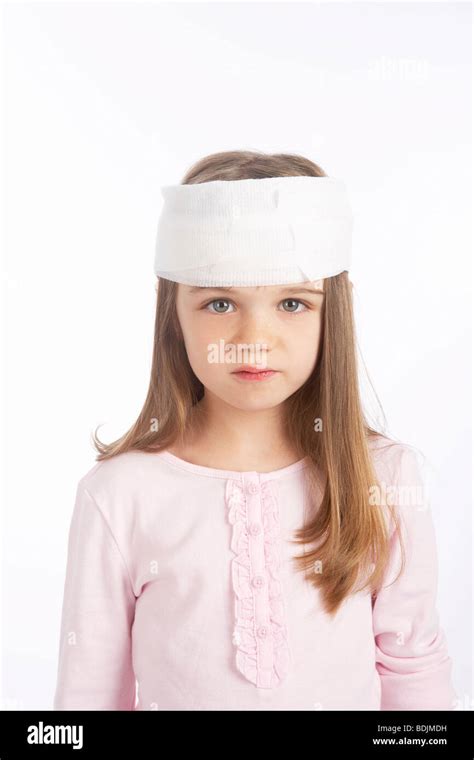 Girl With A Bandage On Her Head Stock Photo Alamy