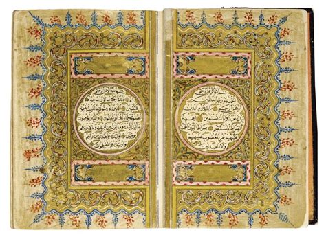 An Open Book With Arabic Writing On The Pages And Two Circular