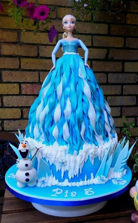 So when we try to replicate it in cake, we have to use our imagination which is why no two tree stump cakes or techniques. Elsa/ Frozen Doll Cake - cake by Pearly Cakes - CakesDecor ...