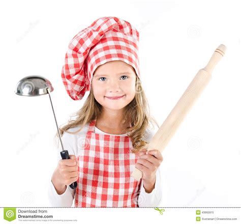 Smiling Cute Little Girl In Chef Hat With Ladle And