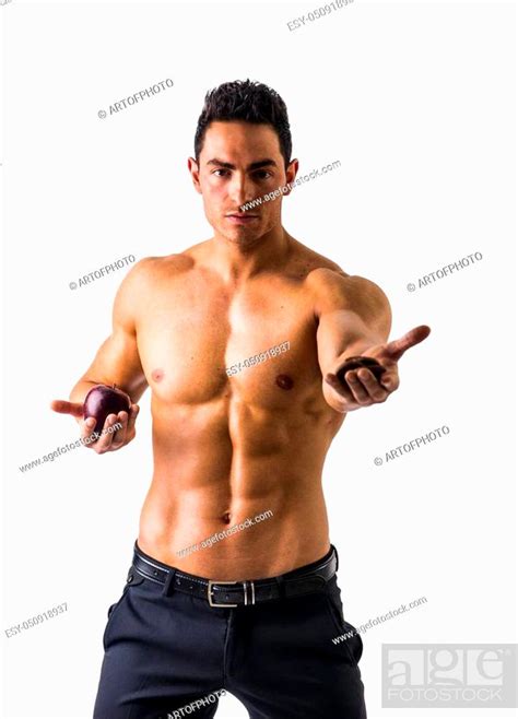 Muscular Shirtless Young Man Deciding Between Healthy Fruit And
