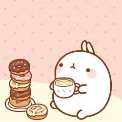A Cartoon Bunny Holding A Cup Of Coffee Next To A Stack Of Doughnuts