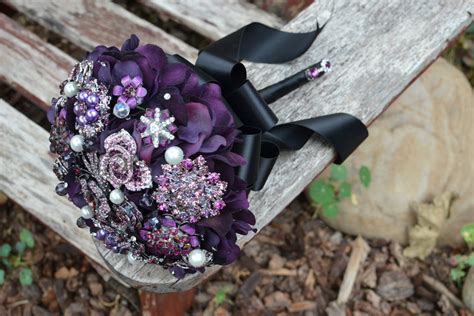 You can also use variation of color with your ribbon. Elegant purple and black brooch bouquet | OneWed.com
