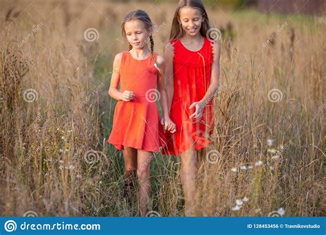 Beautiful Little Blonde Girls Has Happy Fun Cheerful Smiling Face Red