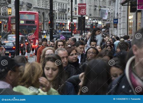 London Uk April 5 2014 People Walking Down The Street In Crowded