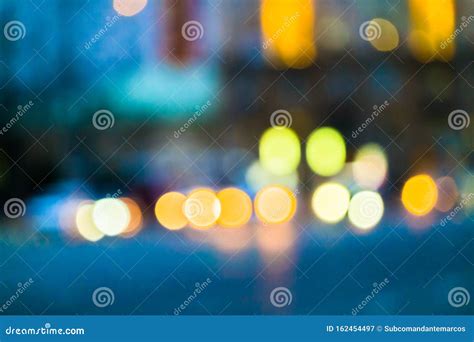 Evening City Traffic In A Giant Metropoliscity Light Bokeh Background