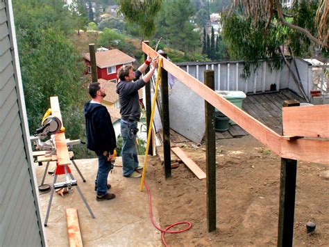 How To Build A Horizontal Plank Fence In A Hillside Backyard Hgtv