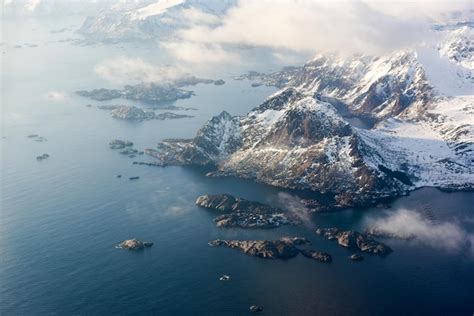 Premium Photo An Aerial View Of The Snow Covered Mountains Of The