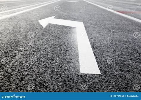 White Turn Left Arrow On The Road Stock Photo Image Of Destination